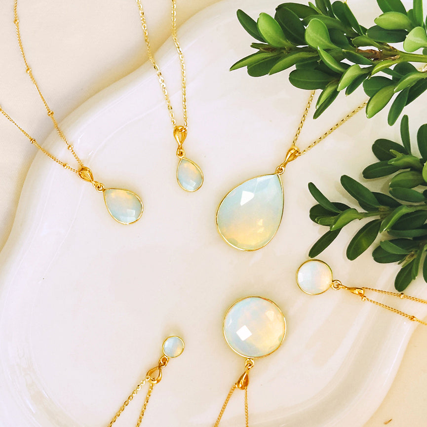 Opalite October birthstone necklace with glowing iridescent stone, symbol of peace, transformation, and renewal, dainty handmade jewelry gift for birthdays, anniversaries, or spiritual meaning.