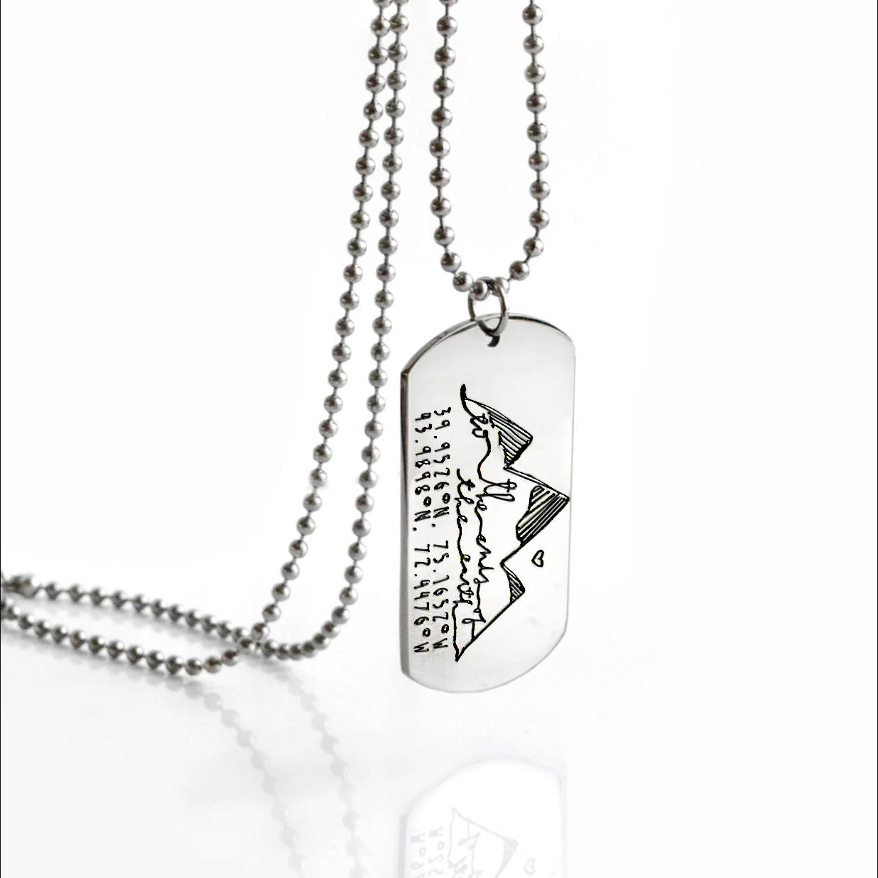 Custom engraved dog tag necklace with mountain design and personalized coordinates, featuring a sleek stainless steel ball chain. This unique travel keepsake jewelry is perfect for adventurers, hikers, or couples marking a special location. Handmade coordinate necklace makes a meaningful gift for him, boyfriend, husband, dad, or best friend to celebrate birthdays, anniversaries, graduations, Christmas or Father’s Day.