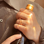 Engraved fingerprint ring shown worn on finger, highlighting 6mm band design in gold. This custom memorial jewelry piece can be personalized with fingerprint, handwriting, or date. A unique keepsake for men or women, perfect for weddings, anniversaries, or as a remembrance gift. Crafted in sterling silver, gold, or rose gold. Ideal for personalized gifts for him, engraved gifts for men, and memorial fingerprint rings.