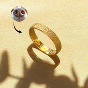 A custom dog nose print ring on a 4mm gold vermeil band, showing the real nose texture engraved from a photo. Unisex pet memorial gift and dog nose jewelry keepsake, handcrafted in the USA with optional inside engraving for a name or date. Perfect gifts for dog lovers, sympathy or remembrance present for loss of a pet, available in sterling silver, gold, or rose gold with laser-engraved details.
