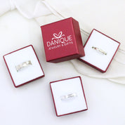 3 rings in boxes showing different types of detailed engravings. Engraved dog nose print ring, personalized pet jewelry, custom dog ring, sterling silver, vermeil gold, rose gold, pet memorial ring, pet keepsake, dog lover gift, unique dog jewelry, custom engraving, dog owner accessory, pet portrait ring, remembrance jewelry, 3 Metal Colors Silver Rose Gold Yellow Gold Metal Ring Bands