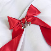 Rose gold double hearts pendant  hoop dangle earrings set on white background with a bow. Heart charms, heart necklace, statement necklace, bohemian jewelry, boho jewelry