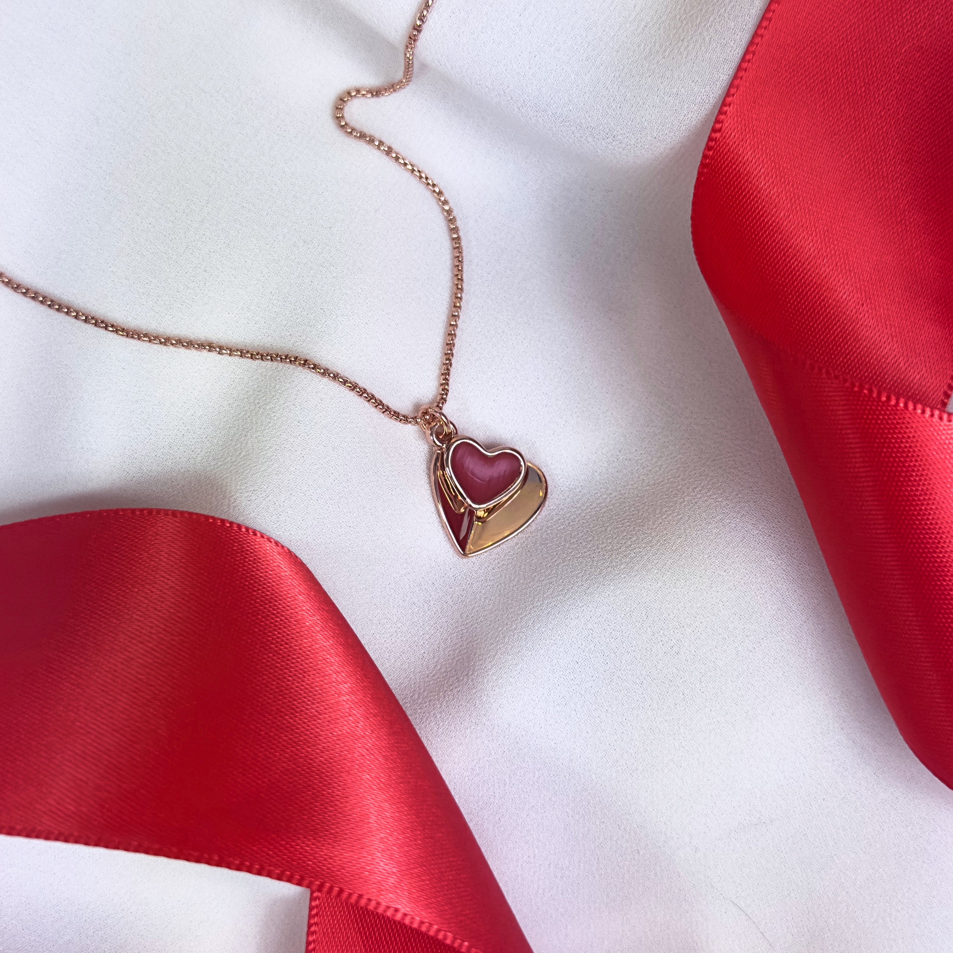 Rose gold double hearts pendant necklace white background. Heart charms, heart necklace, statement necklace, bohemian jewelry, boho jewelry