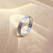 Sterling silver 4mm band featuring a finely detailed dog nose jewelry engraving taken from a customer-supplied photo. Unisex and stackable, this engraved memorial jewelry piece can include inside text such as a name, date, or short message. A beautiful pet remembrance gift for celebrating a lifelong bond, handcrafted in the USA with durable laser engraving.