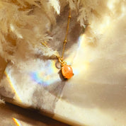 Dainty sunstone pendant necklace in gold vermeil, featuring a warm orange oval gemstone that shimmers in the light. A thoughtful custom jewelry gift for her—perfect for birthdays, anniversaries, or holiday gifting. Handcrafted with love and designed for everyday elegance, this personalized sunstone necklace adds a radiant touch to any outfit. Ideal for boho, minimalist, or spiritual jewelry lovers. Custom engraving available.