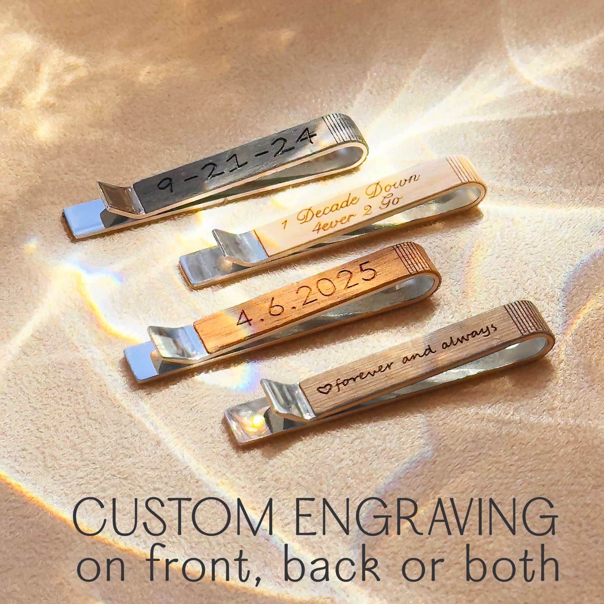 Styled flat-lay featuring our wood tie clip and matching cufflinks with metal finishes—rhodium silver and brass gold—alongside wood choices (walnut, mahogany, birch, cedar, afromosia, ebony). Laser-engraved monograms, names or dates available on front/back of tie clip and both cufflinks. Great for groomsmen gift ideas, unique groomsmen gifts, corporate gifts and 5th anniversary presents.
