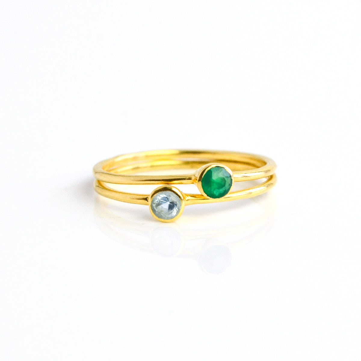 two gold plated dainty 3mm green onyx and kyanite gemstone rings. On white background. 925 sterling silver, birthstone ring, stacking ring, stackable, birthstone jewelry, facet gemstone
