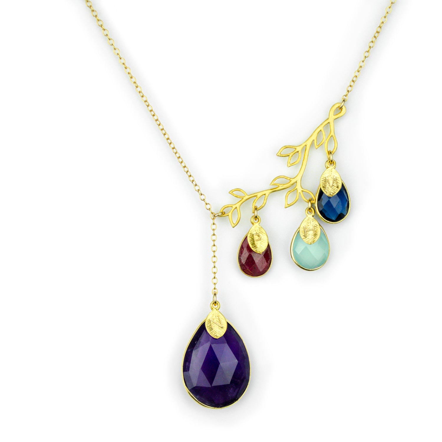 Gold filled family tree branch necklace with kyanite for the mother's stone, garnet aqua chalcedony and kyanite for the children's stones and gold stamped leaves.