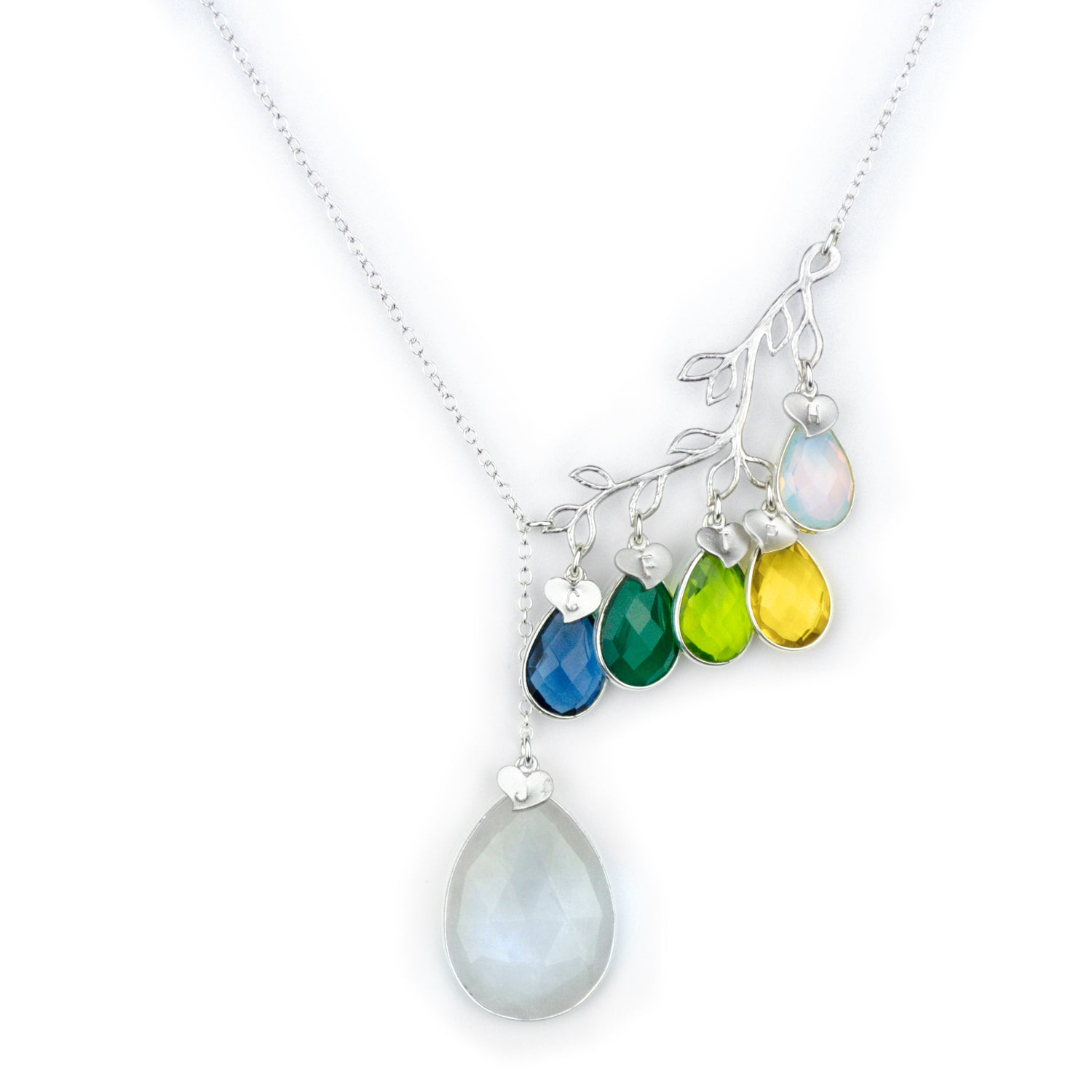 Family tree branch with large moonstone, small kyanite, green onyx, peridot, citrine and opalite stones with matching stamped heart charms.