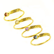 collection of four stacking rings gold plated name bar rings with garnet, citrine, purple amethyst and iolite birthstones. engraved name ring, birthstone jewelry, birthstone rings