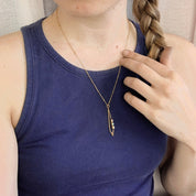 model jewelry, satellite chain, three stone pendant necklace