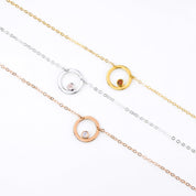 Rose gold filled circle moonstone birthstone necklace, Sterling silver open circle geometric necklace with pink chalcedony birthstone and a gold filled open circle necklace with garnet birthstone.