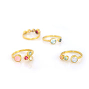 Adjustable Birthstone Rings Mother's Rings Mom of 1 Mom of 2 Kids Mother of 3 Children Yellow Gold Mother's Adjustable Ring Collection Up to Three Small Stones Gift for Mom gold filled four rings shown featuring blue topaz, kyanite, moonstone and pink and aqua chalcedony, ruby with peridot, citrine and purple amethyst, and pink chalcedony with clear, blue topaz and ruby birthstones