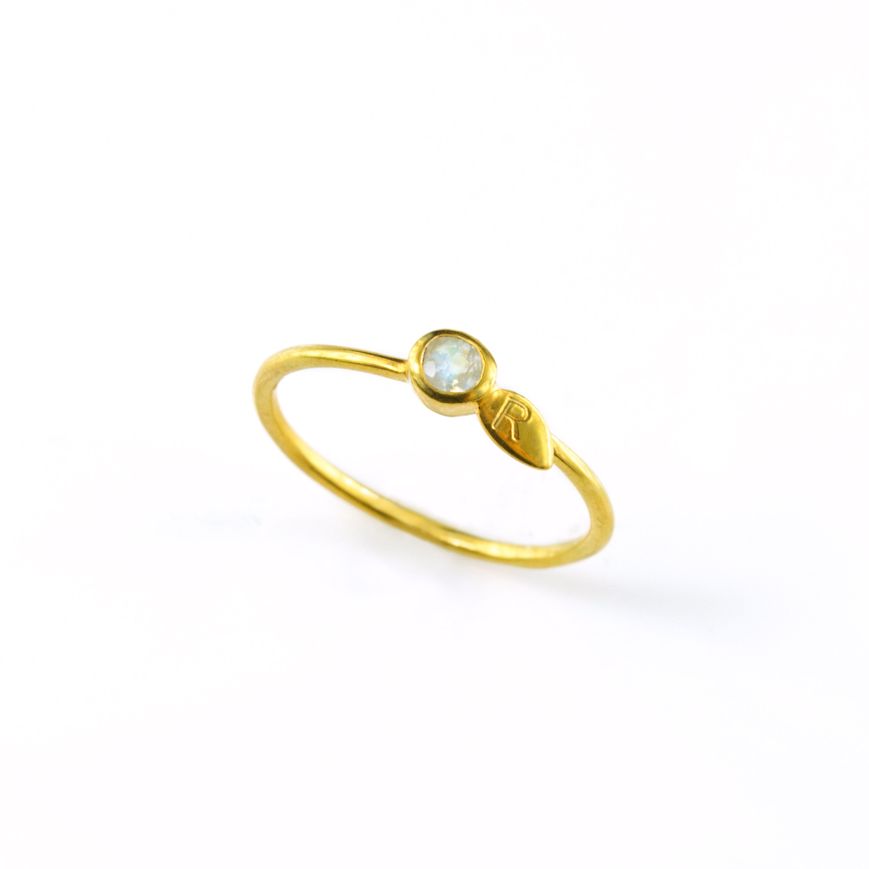 One custom engraved leaf initial birthstone dainty stacking ring. Get all of your kids initials and stack together or wear separately.