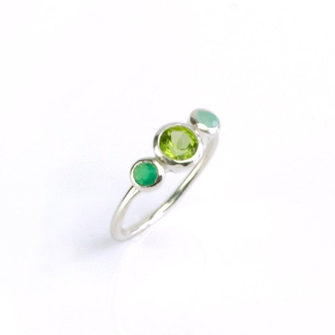 Single sterling silver mothers birthstone ring with a 5mm peridot gemstone and green onyx and aqua chalcedony kids birthstones.