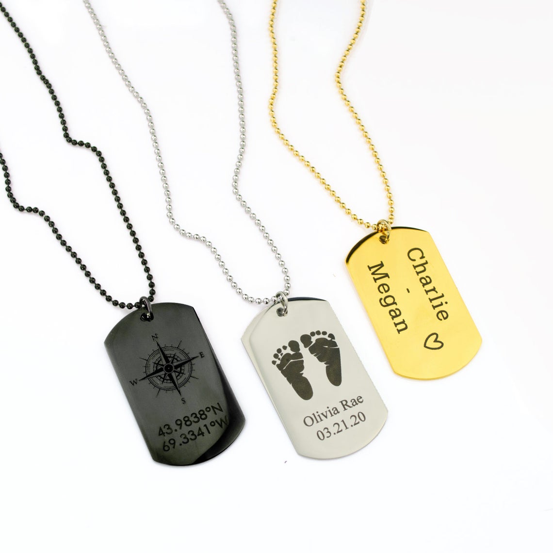 Personalized dog tag necklace in silver, black, and gold stainless steel with custom engraving options like coordinates, baby footprints, and names, perfect custom gift for men, boyfriend, or husband for birthdays, anniversaries, or Christmas holidays, unisex military-style pendant keepsake jewelry, includes ball chain necklace and durable finish, meaningful engraved accessory designed as a timeless keepsake piece that can be worn daily or gifted for special occasions, made in the USA.