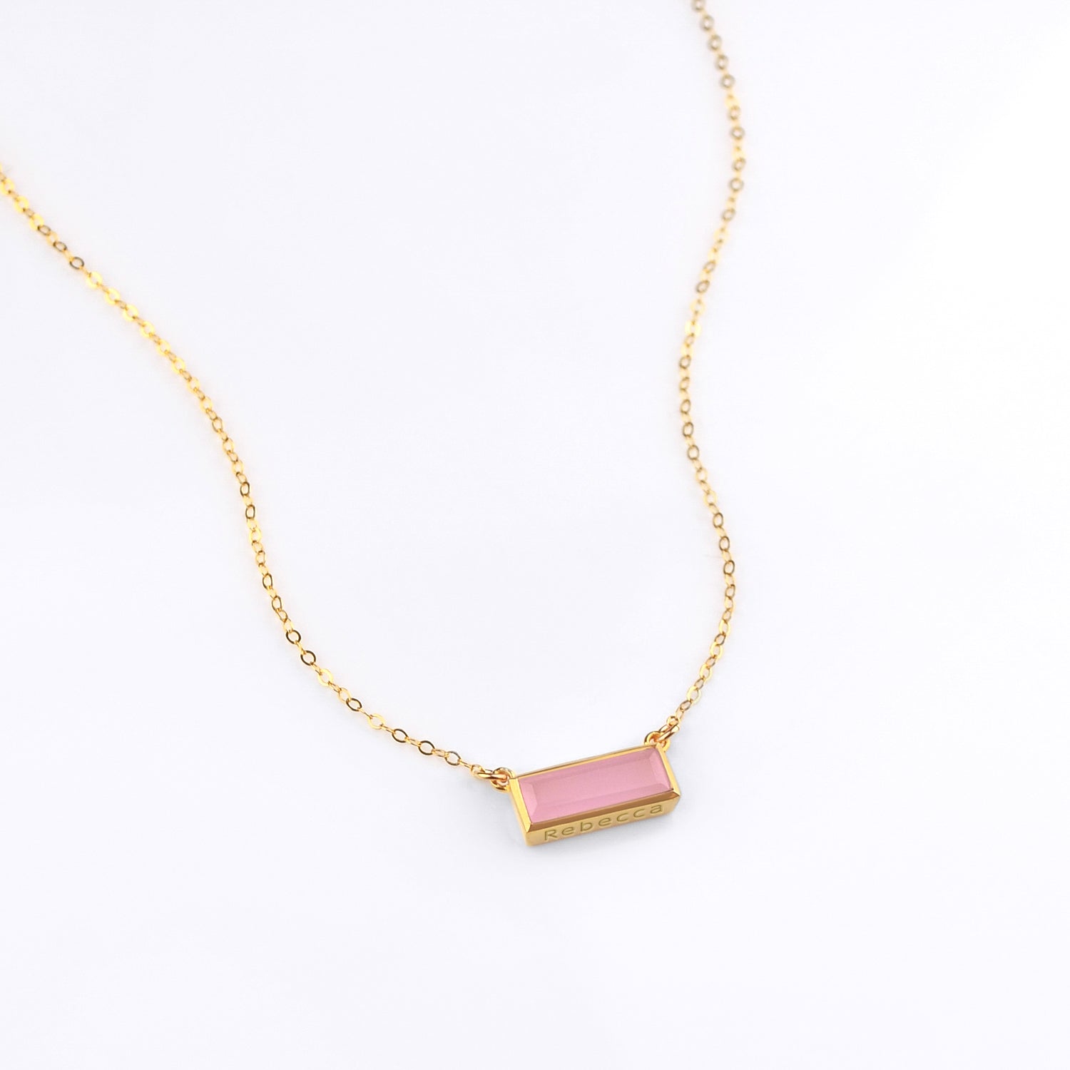 Single gold filled cable chain with october birthstone pink chalcedony horizontal bar adira necklace with secret message engraved on the bottom