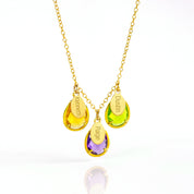 Gold filled chain with three birthstones, citrine, purple amethyst and peridot with engraved name tags.
