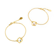 Two gold filled geometric square adjustable bracelets with kyanite and purple amethyst birthstones on a white background.