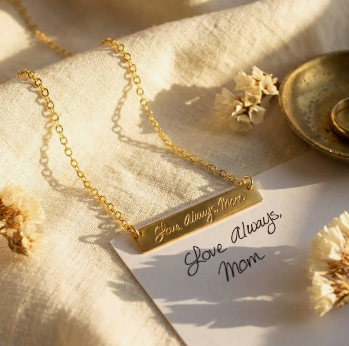 Custom handwriting bar necklace engraved with a loved one’s note or signature, a meaningful personalized jewelry gift for mom, remembrance, birthdays, or Mother’s Day in silver, gold, or rose gold.