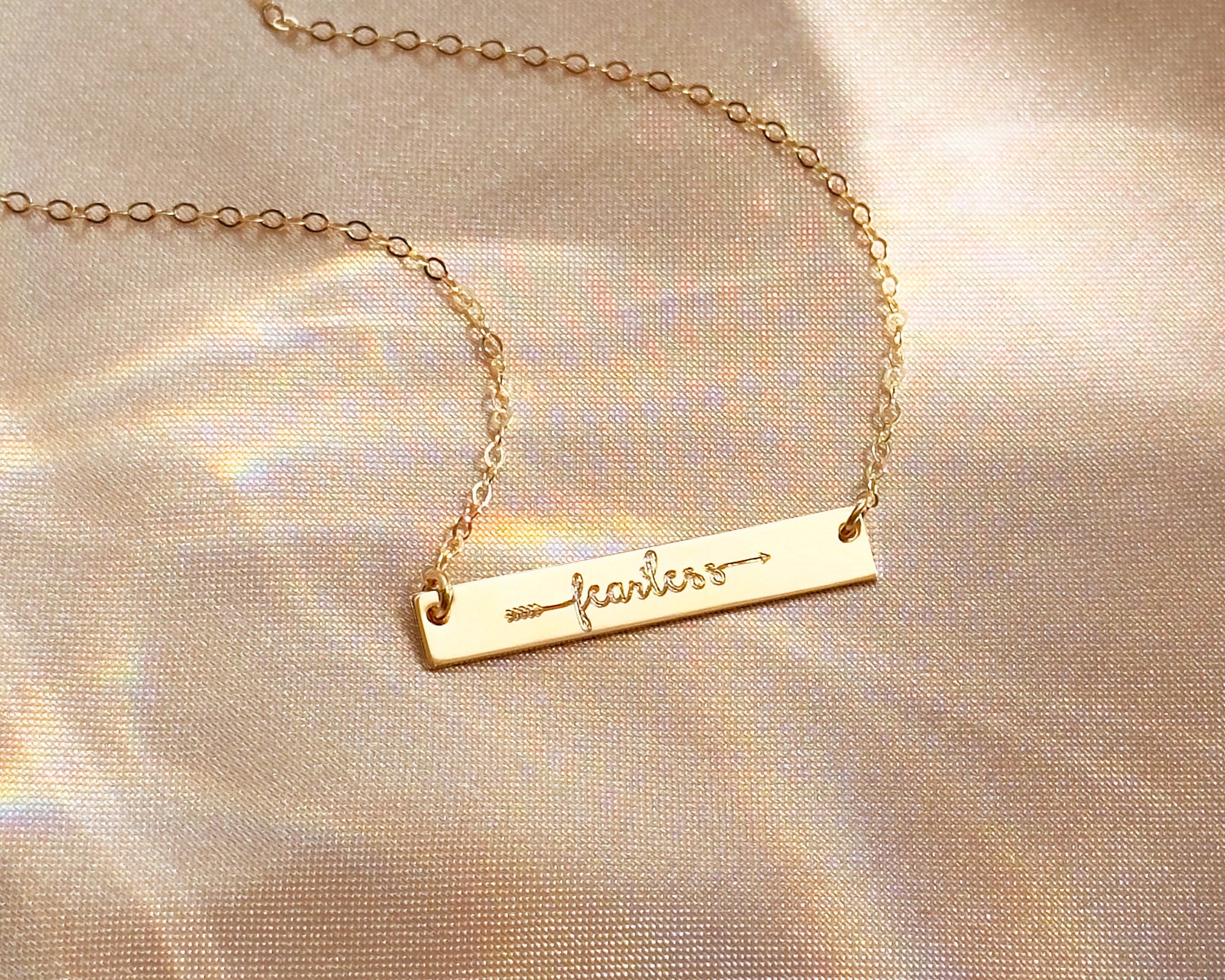 Custom plate necklace engraved with fearless, brave, or personal word. Sterling silver, yellow or rose gold-filled. Encouragement gift for back to school, new job, or moving to a new city.