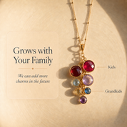 Cascade birthstone necklace with green, purple, blue, and red gemstones showing how family stones can be arranged.