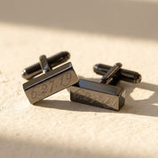Black 3D bar cufflinks engraved with a meaningful date and custom text.