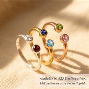 Adjustable birthstone rings in gold, rose gold, and silver with natural gemstones, showing different color combinations and stacking options