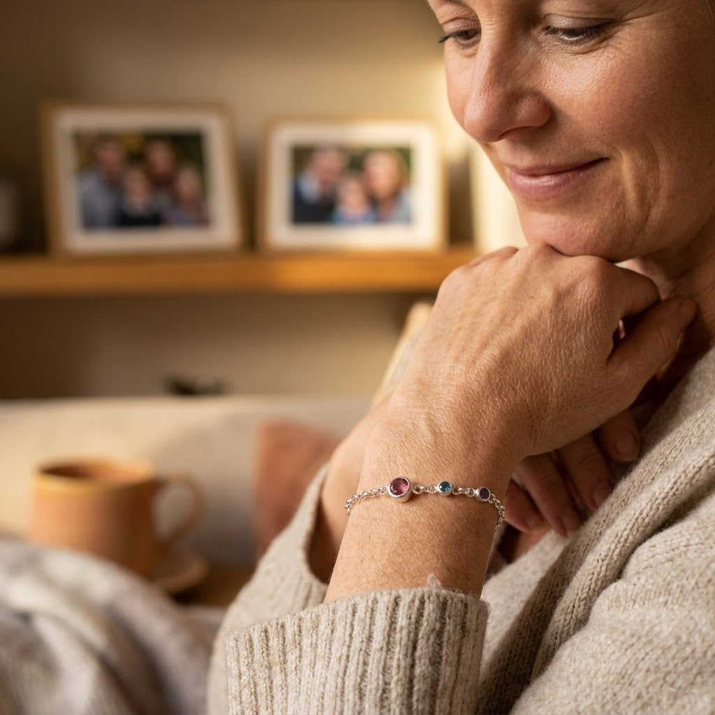 Custom birthstone bracelet for mom featuring colorful gemstones for each child, sentimental Mother’s Day gift idea with personalized initial charms
