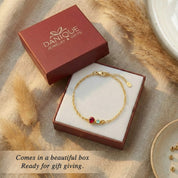 This custom family birthstone bracelet blends elegance and sentiment with carefully set gemstones on a fine gold chain, making it a timeless push present or meaningful grandma gift.