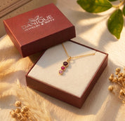 Gift-ready custom birthstone necklace displayed in a Danique Jewelry box, perfect for birthdays, new moms, grandmas, wives, and personalized family gifts.