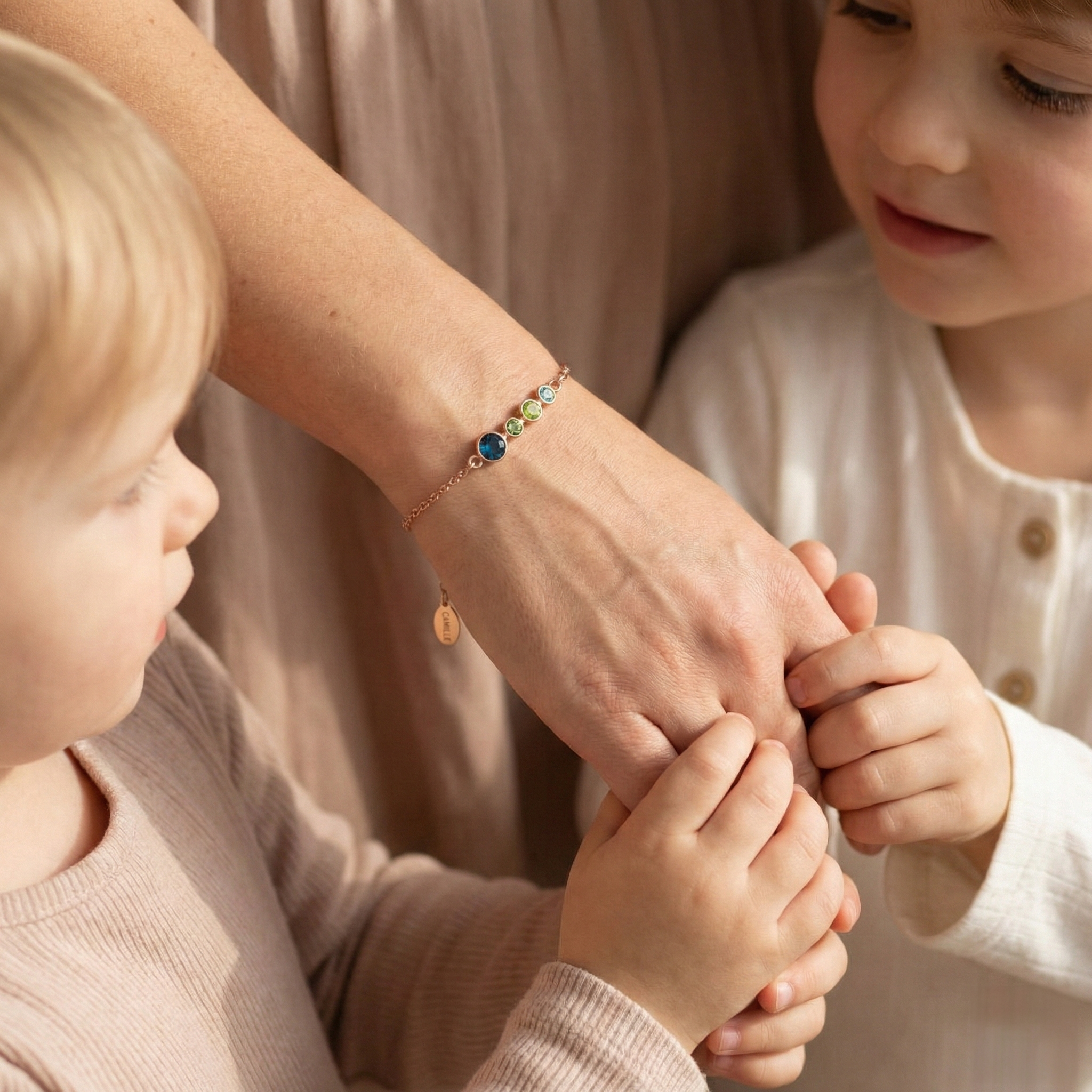Crafted in sterling silver, this custom mother and child birthstone bracelet features adjustable sizing and a minimalist bar layout, making it a thoughtful anniversary, birthday, or Mother’s Day gift.