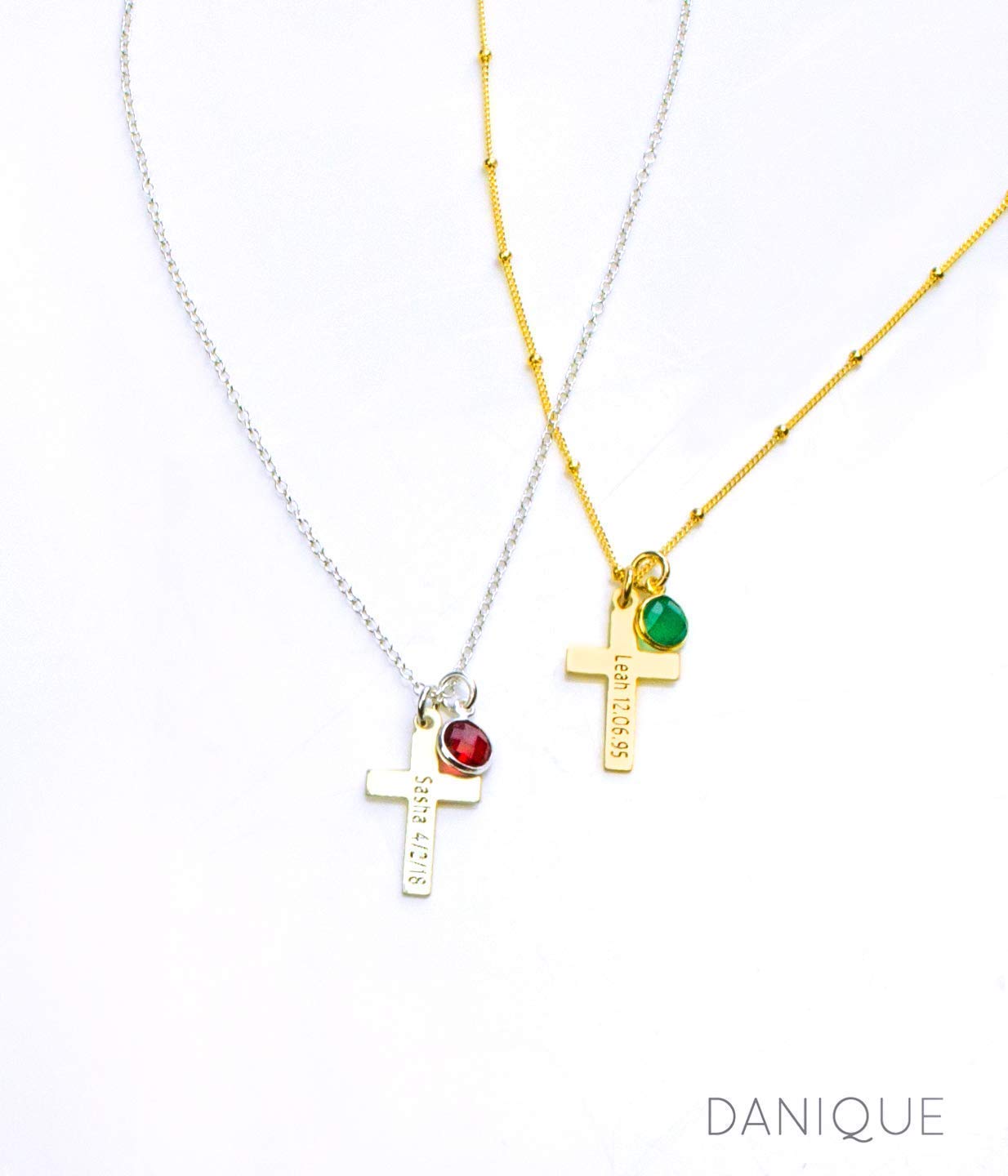 one sterling silver engraved cross necklace with garnet birthstone on cable chaine. One gold plated engraved cross necklace with green onyx birthstone on satellite chain. Birthstone jewelry, first communion gift, easter gift, religious jewelry, cross jewelry, cross necklace, baptism gift, communion gift, gift or her, religious necklace, engraved cross charm, gift for mom, gift for teen, gift for girl, christmas gift, valentine's gift, birthday gift, anniversary gift. 