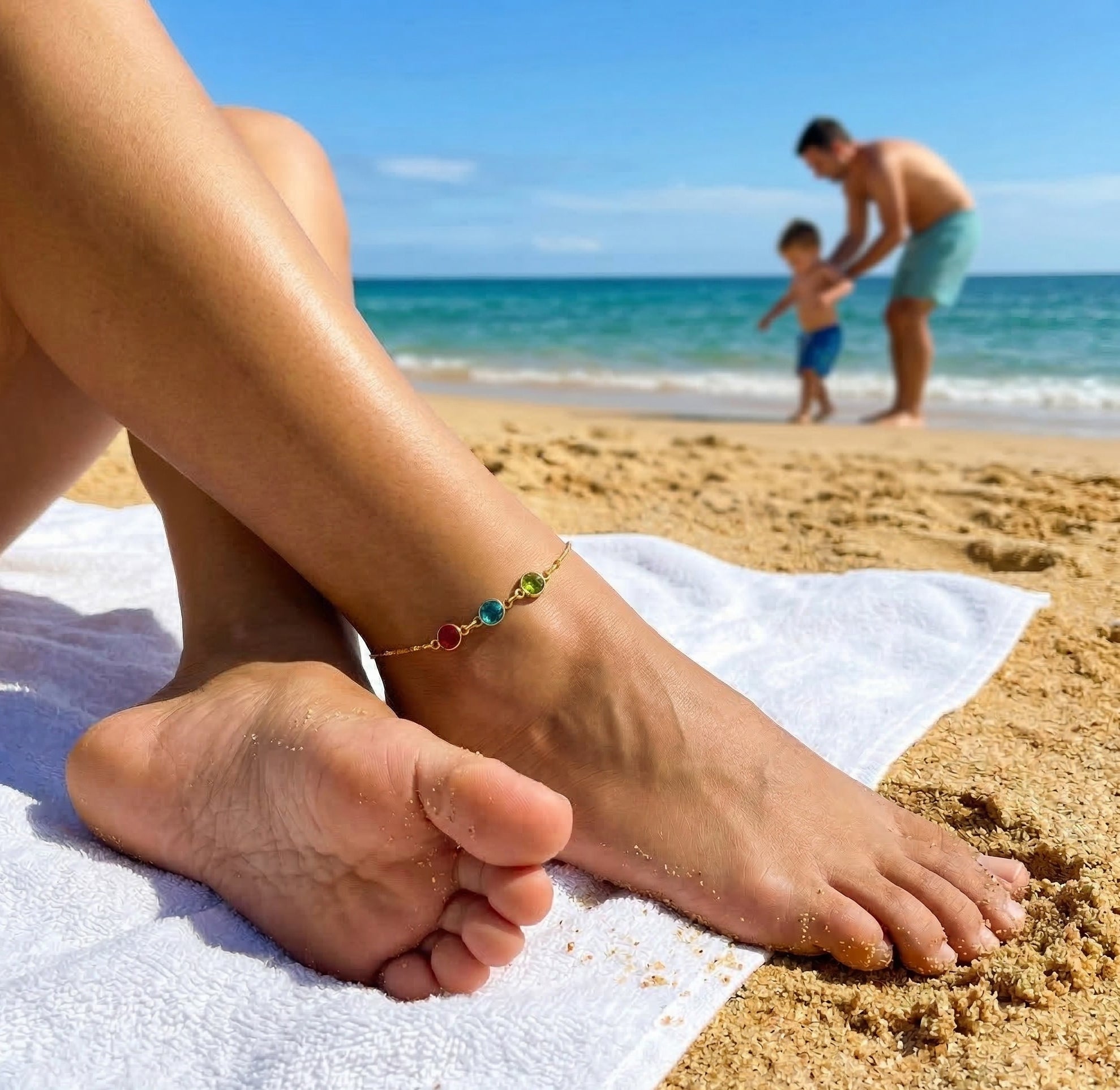 Personalized birthstone anklet worn at the beach, dainty family anklet gift