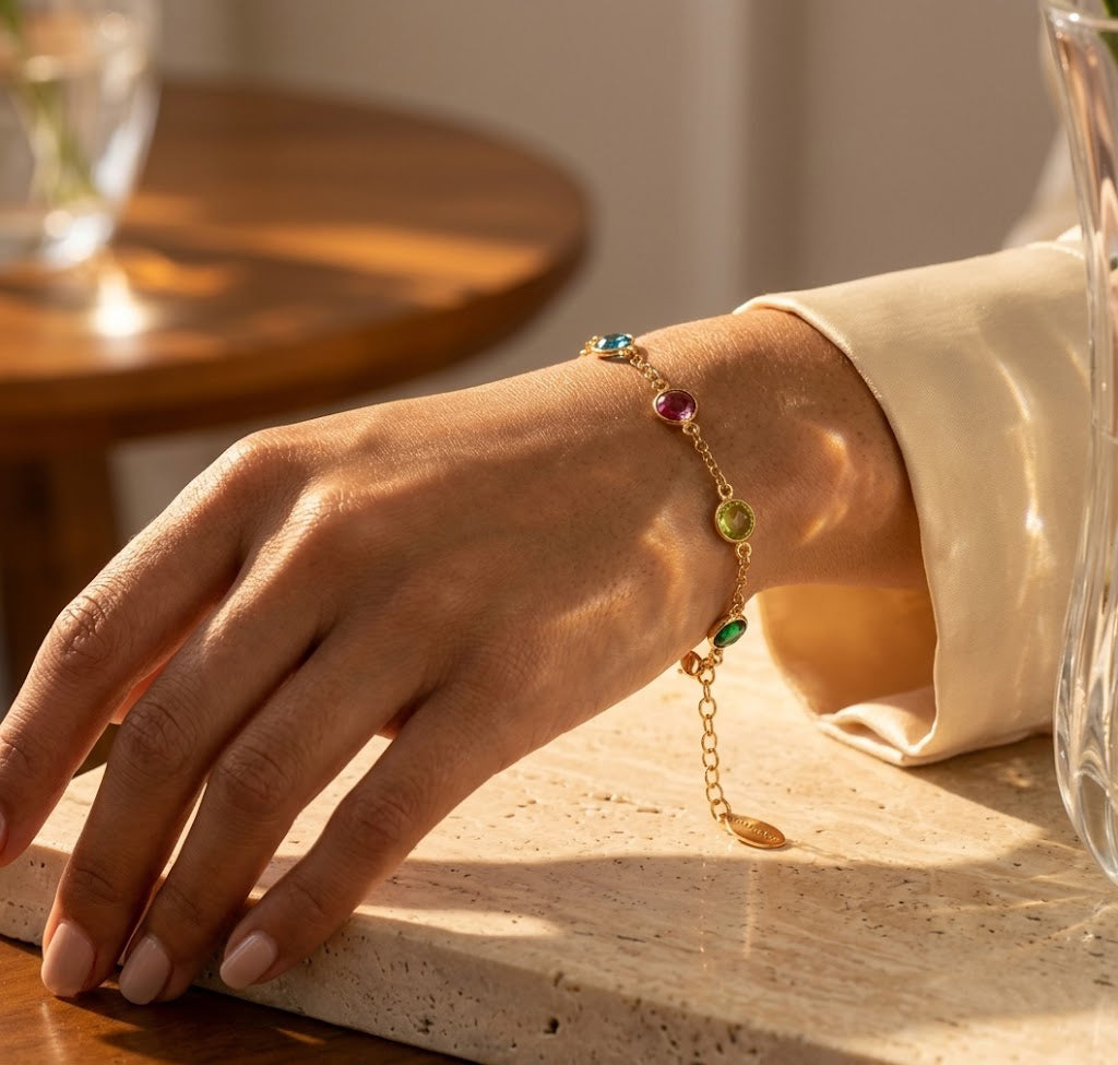 minimalist rose gold birthstone bracelet worn on hand, custom multistone jewelry inspired by Taylor Swift style