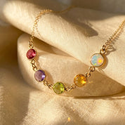 Custom birthstone necklace for mom with multiple gemstones on gold chain