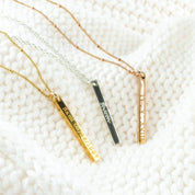 gold plated, sterling silver and rose gold plated dainty bar necklaces on white blanket. necklaces for women, gift for her, gift for wife, birthday, christmas gift, valentine's day gift, gift for girlfriend, anniversary gift, silver anniversary, gold anniversary, personalized jewelry, custom jewelry, gift for fiance, holiday gift, unique gift ideas, necklaces for her, wedding party gifts, bridal party gifts, prom season, prom jewelry, birthstone necklaces, engraved necklaces, grad gift, graduation gift