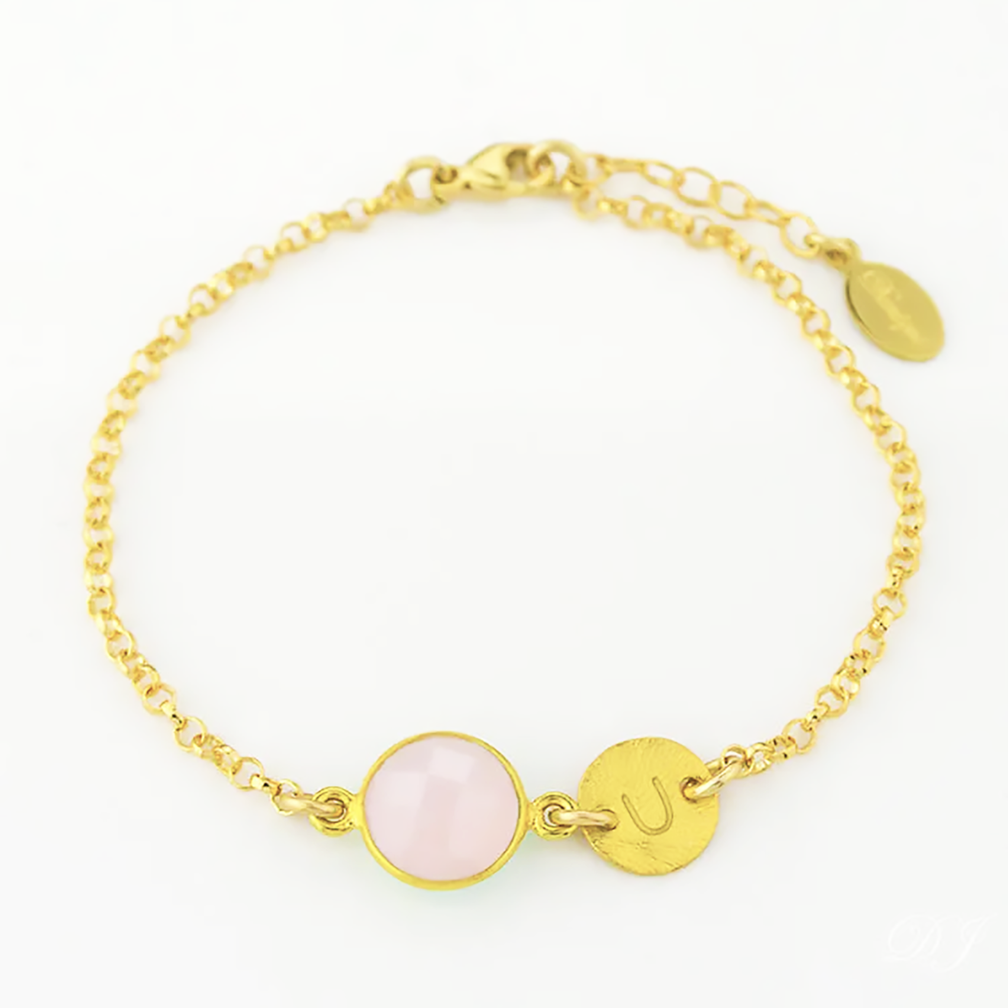 Custom gold filled pink chalcedony birthstone bracelet with brushed hand stamped initial disk on a white background. october birthstone bracelet, initial bracelet. 