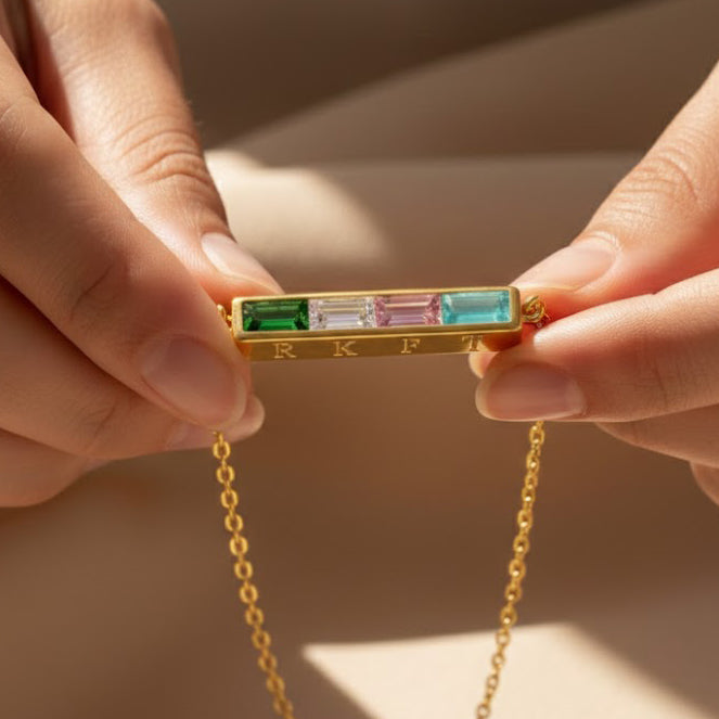 Hands holding personalized birthstone bar bracelet, custom engraved bracelet with hidden initials, rectangular birthstone jewelry for women, dainty minimalist bracelet in gold, silver, or rose gold, meaningful custom gift for mom, sister, daughter, bridesmaid, or best friend, birth month stone bracelet with elegant modern personalized design