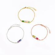 Three multiple baguette birthstone bracelets in gold and silver with customizable gemstones, ideal for Mother’s Day or birthday gifts.