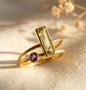 Adira gemstone bar ring with petite round birthstone rings in yellow gold
