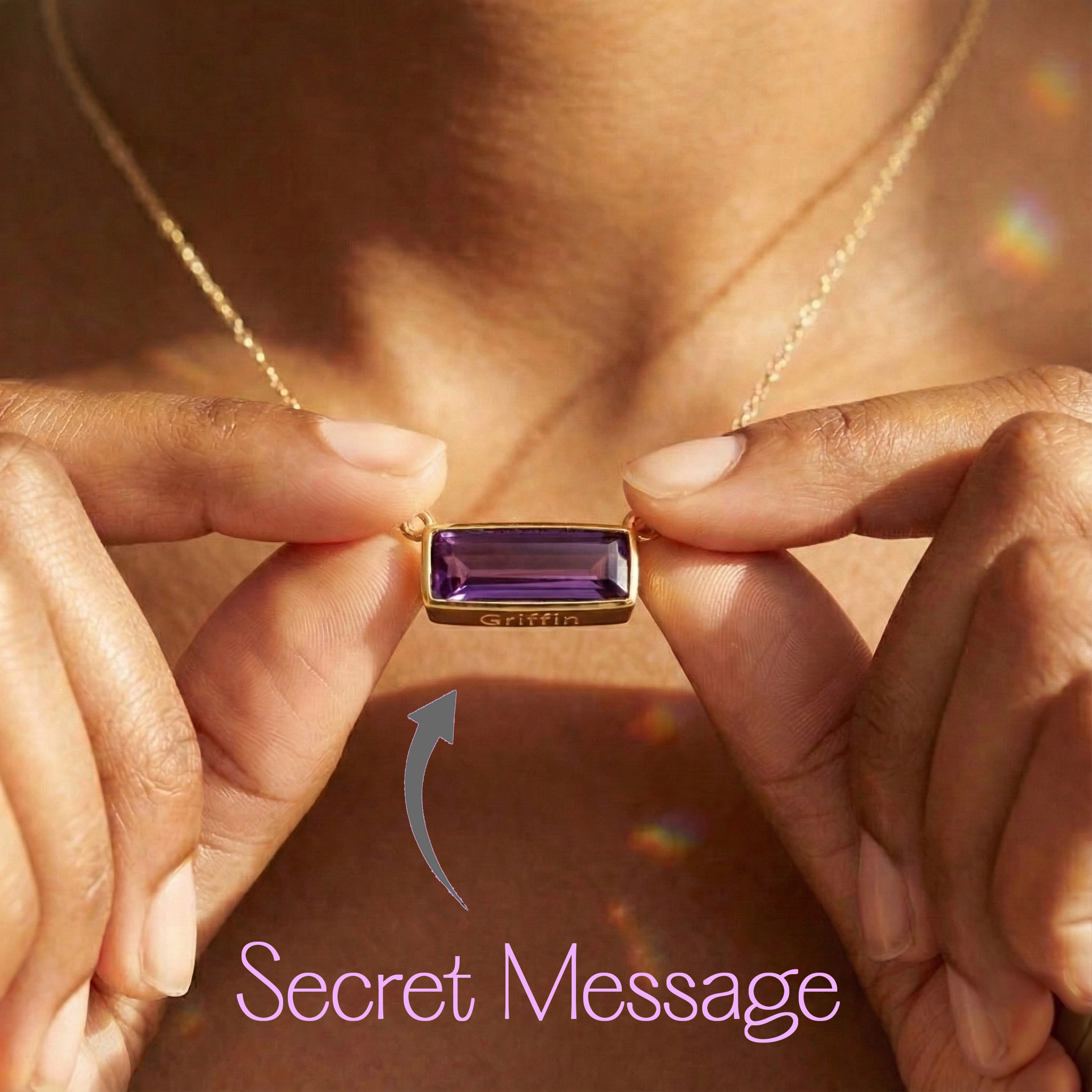 Model wearing a gold amethyst birthstone bar necklace styled on an 18 inch chain