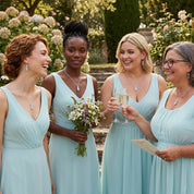 Bridesmaids wearing personalized aqua chalcedony necklaces, meaningful March birthstone jewelry for wedding party gifts.