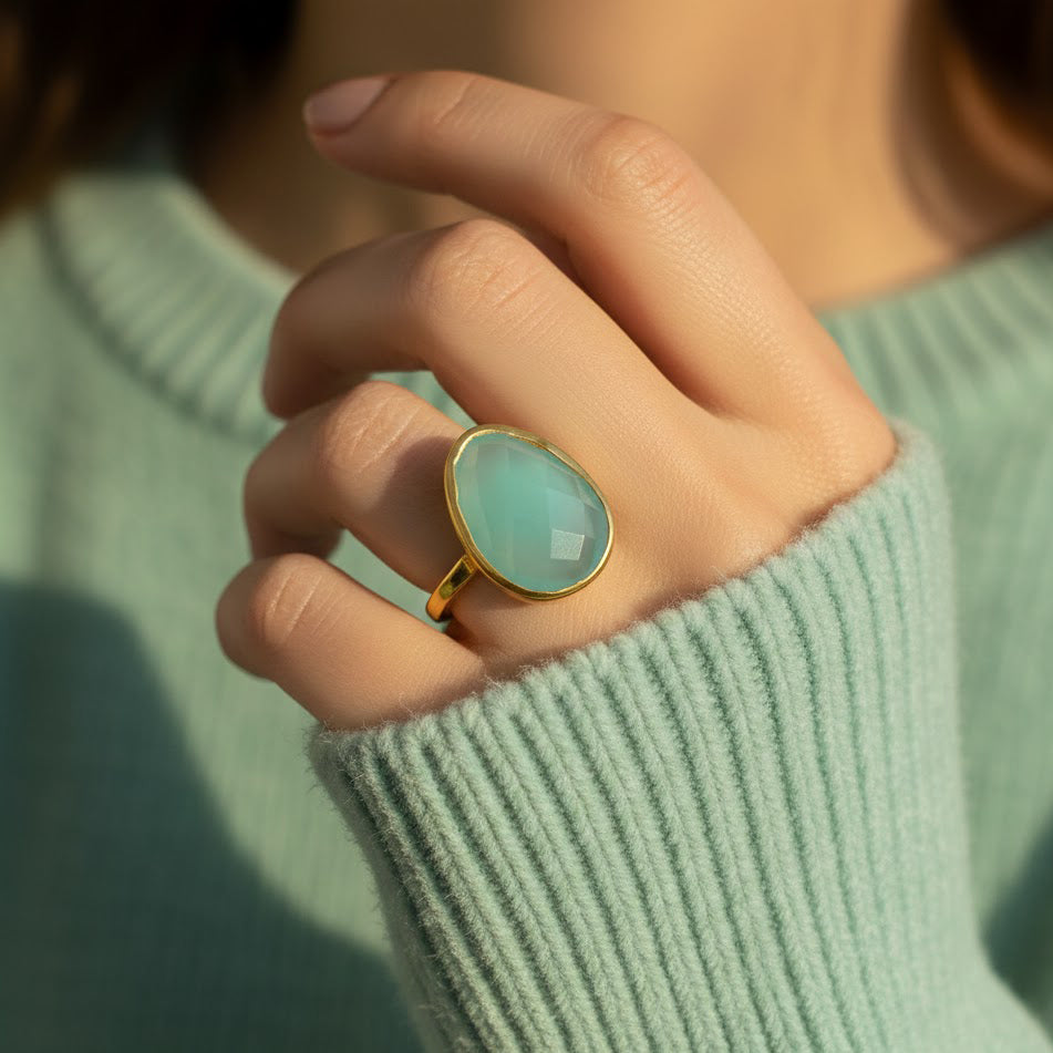 Close up of Aqua Chalcedony gemstone ring in gold bezel setting, available in sterling silver, yellow or rose gold