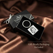 Custom baby photo keychain presented in premium gift-ready packaging, displayed in a Danique Jewelry box. This personalized engraved baby picture keychain is crafted from stainless steel and arrives ready for gifting, making it an ideal keepsake gift for new moms, baby showers, Mother’s Day, or meaningful memorial jewelry.