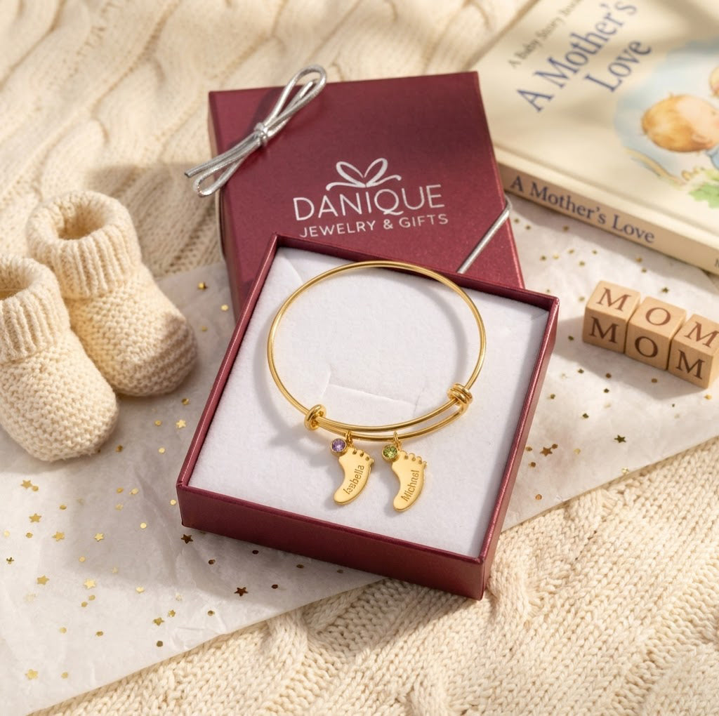 Danique Jewelry gift box with personalized footprint bangle bracelet, ready for gifting to mom or grandma.