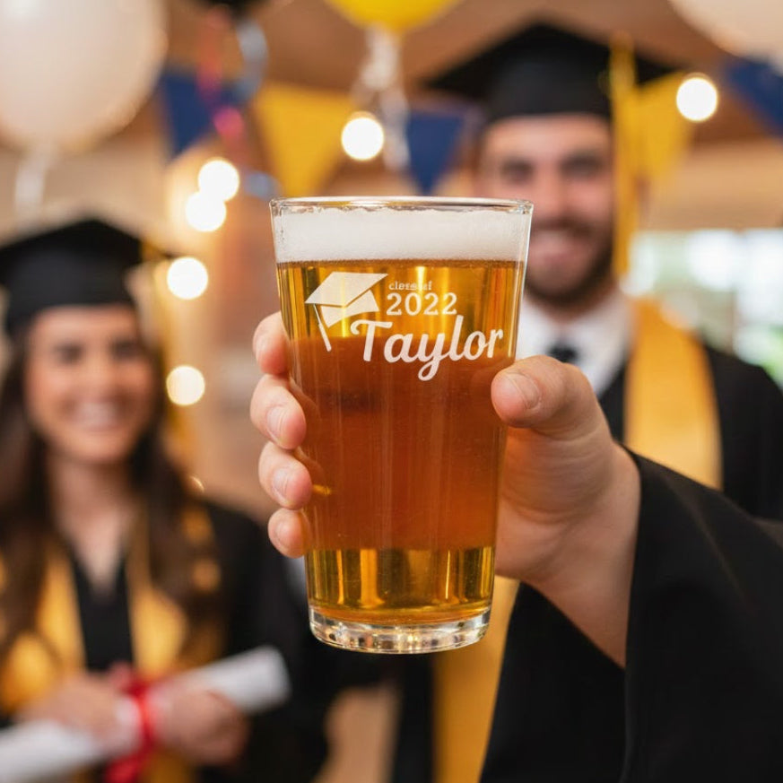Custom engraved beer glass with graduation design featuring personalized name and year, etched pint glass gift for graduate 2024, unique personalized beer gift for college grad or high school graduation celebration.