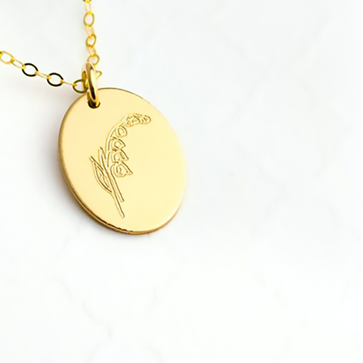 Birth flower, birth month flower oval disc addition chain not included. choose one or both sides engraved. 