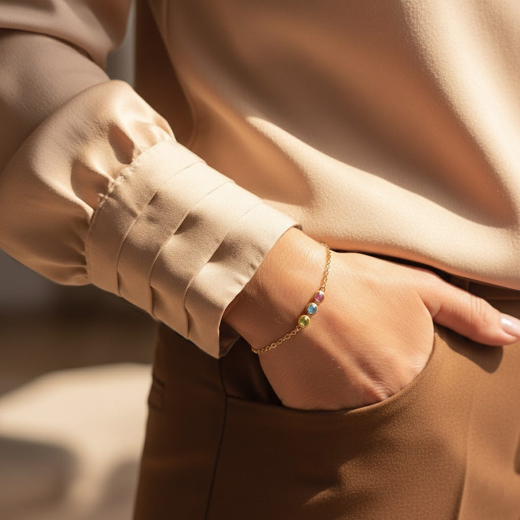 A model in a white shirt has her hand in her pocket and wears two birthstone bracelets. These bracelets are perfect for women, grandma, mom, birthstone friendship bracelets. Gifting ready! layering bracelets, layer bracelet, gemstone, birthstone ring, mother's day gift for her, gift for mom, gift for fiance, gift for girlfriend, wedding jewelry, bridesmaid jewelry, anniversary jewelry, anniversary gift, birthday gift, christmas gift, valentine's day gift, wedding jewelry, prom jewelry