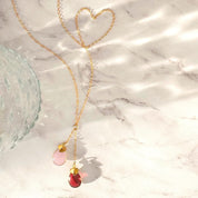 Gold lariat necklace with pink chalcedony and garnet birthstones. October birthstone, january birthstone, october birthstone necklace, jewelry gift, necklace gift for her, anniversary gift, christmas gift, valentine's day gift, wedding jewelry, bridesmaid's jewelry, gift for mom, gift for wife, gift for girlfriend, gift for grandma, mother's day gift